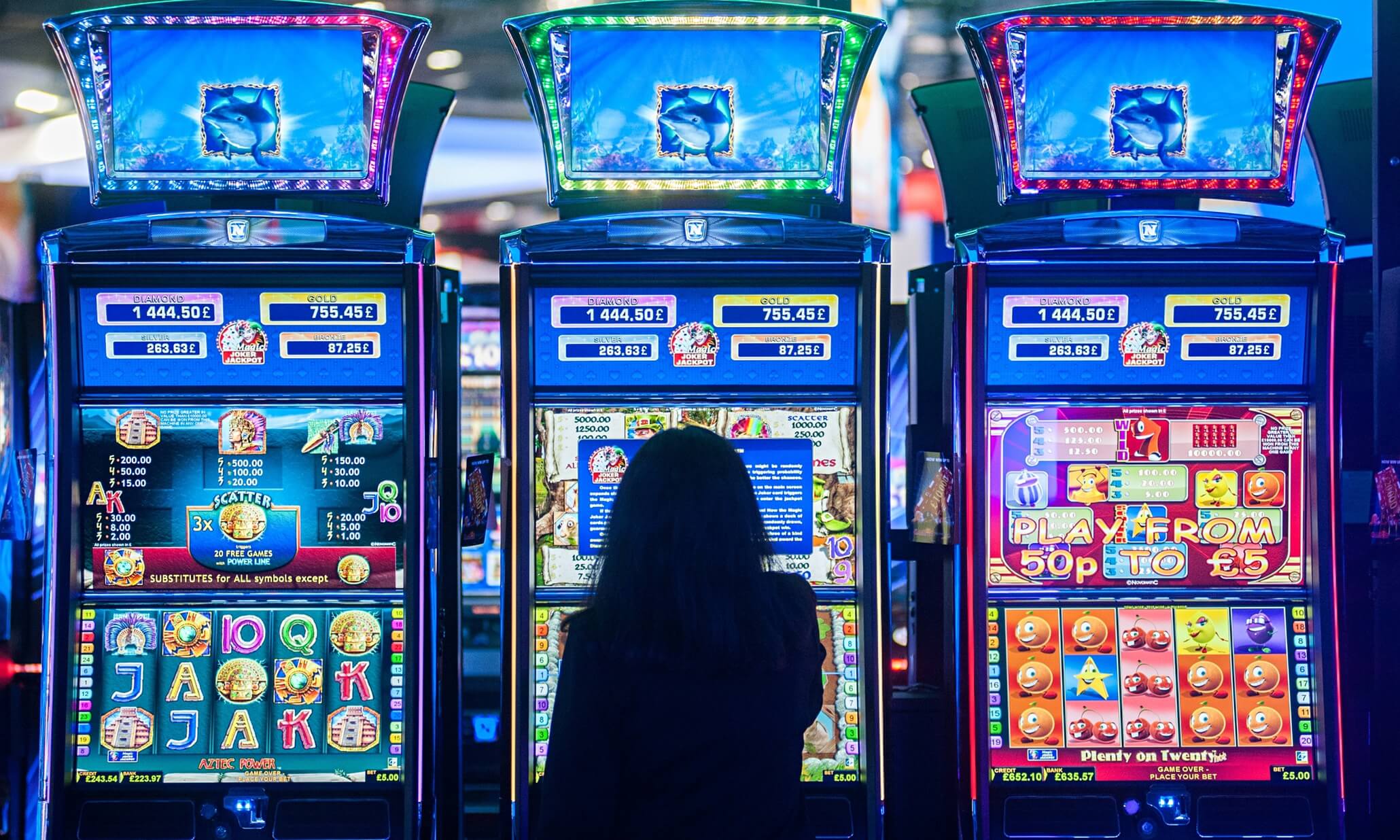 Live casino dealer at a gaming table